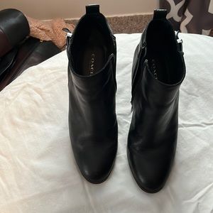 In new condition Coach black booties